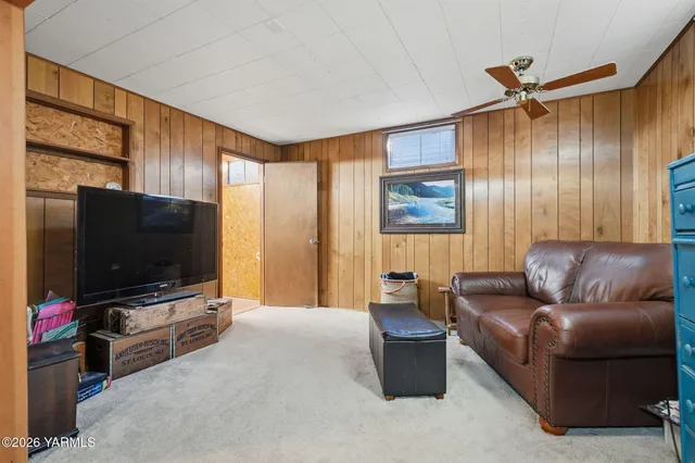 an aerial view of a house with a swimming pool