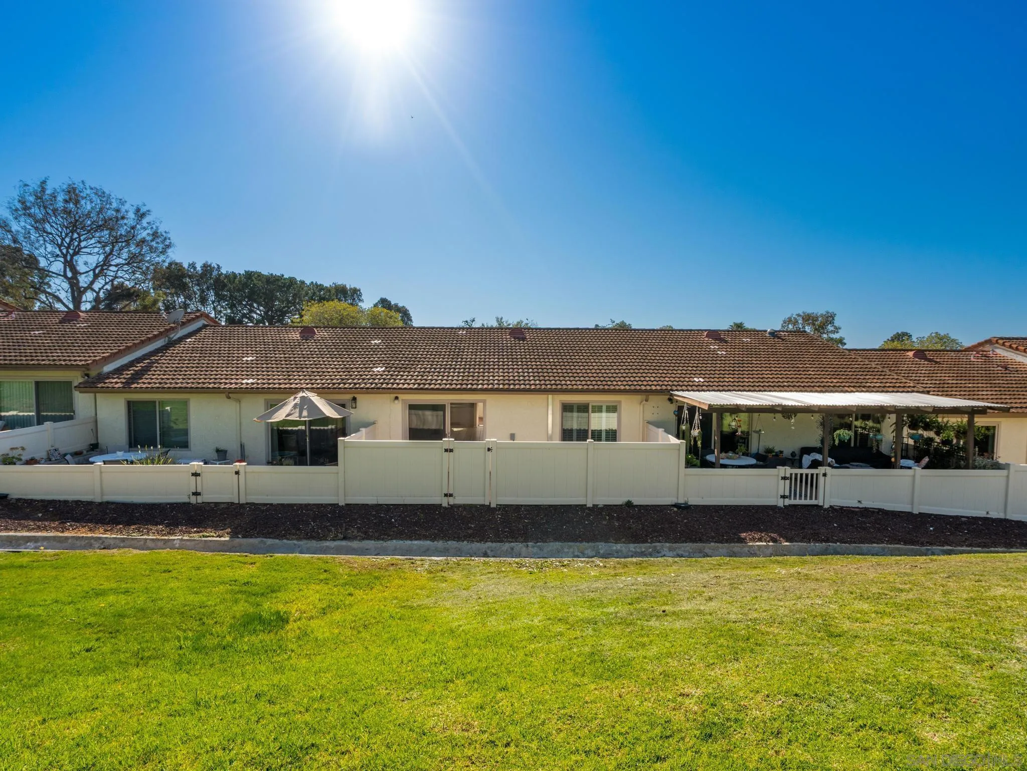 1822 Stanton Road Encinitas, CA 92024 - Photo 14 of 21 a front view of a house with a yard