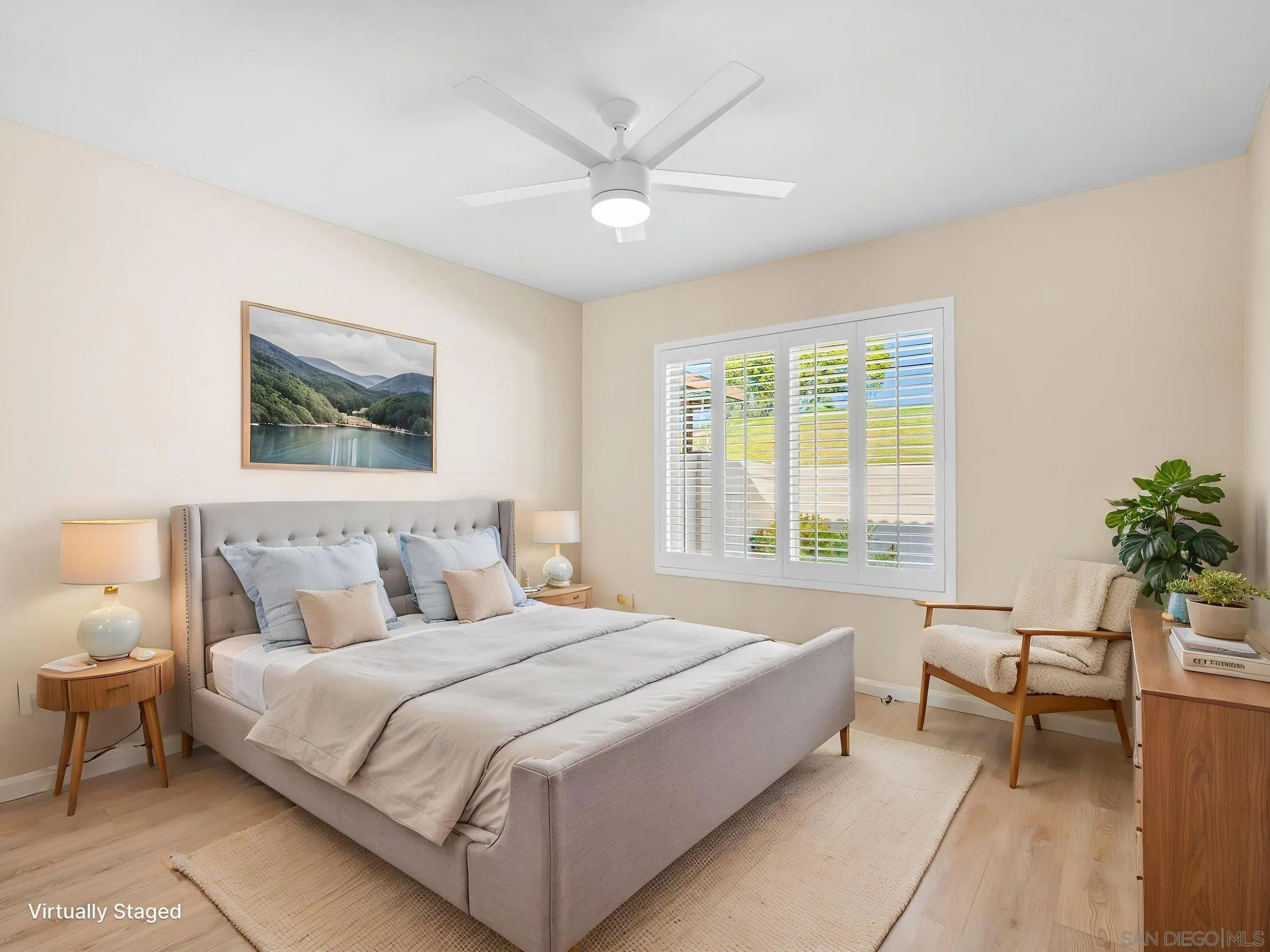 1822 Stanton Road Encinitas, CA 92024 - Photo 9 of 21 a bedroom with a large bed and a window