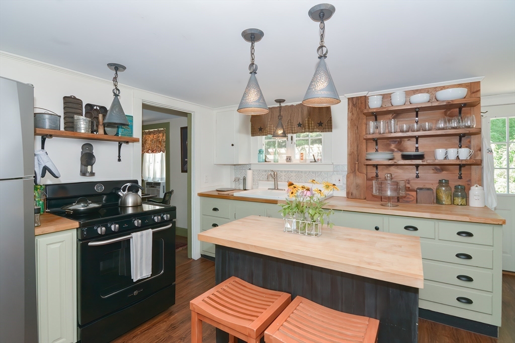 366 Breakneck Road Southbridge, MA 01550 - Photo 3 of 33 a kitchen with a sink stainless steel appliances and cabinets