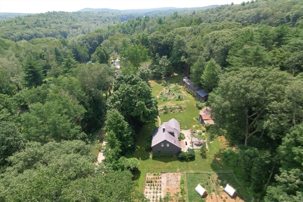 366 Breakneck Road Southbridge, MA 01550 - Photo 32 of 33 an aerial view of a house with a yard
