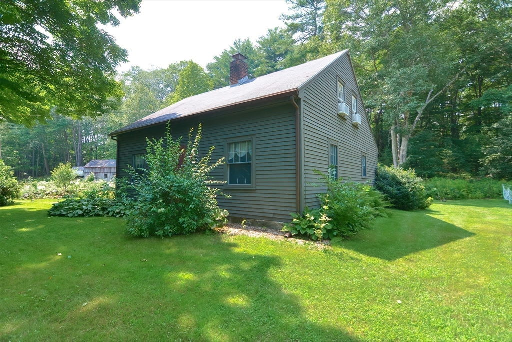 366 Breakneck Road Southbridge, MA 01550 - Photo 33 of 33 a view of a backyard with plants and large tree