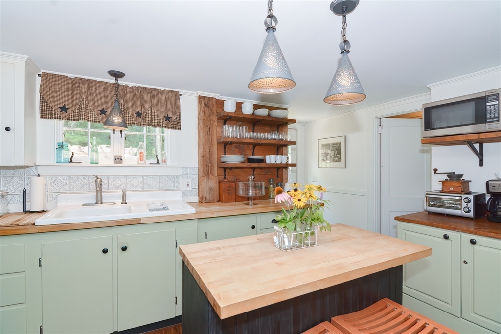 366 Breakneck Road Southbridge, MA 01550 - Photo 4 of 33 a kitchen with a sink a counter space cabinets and appliances