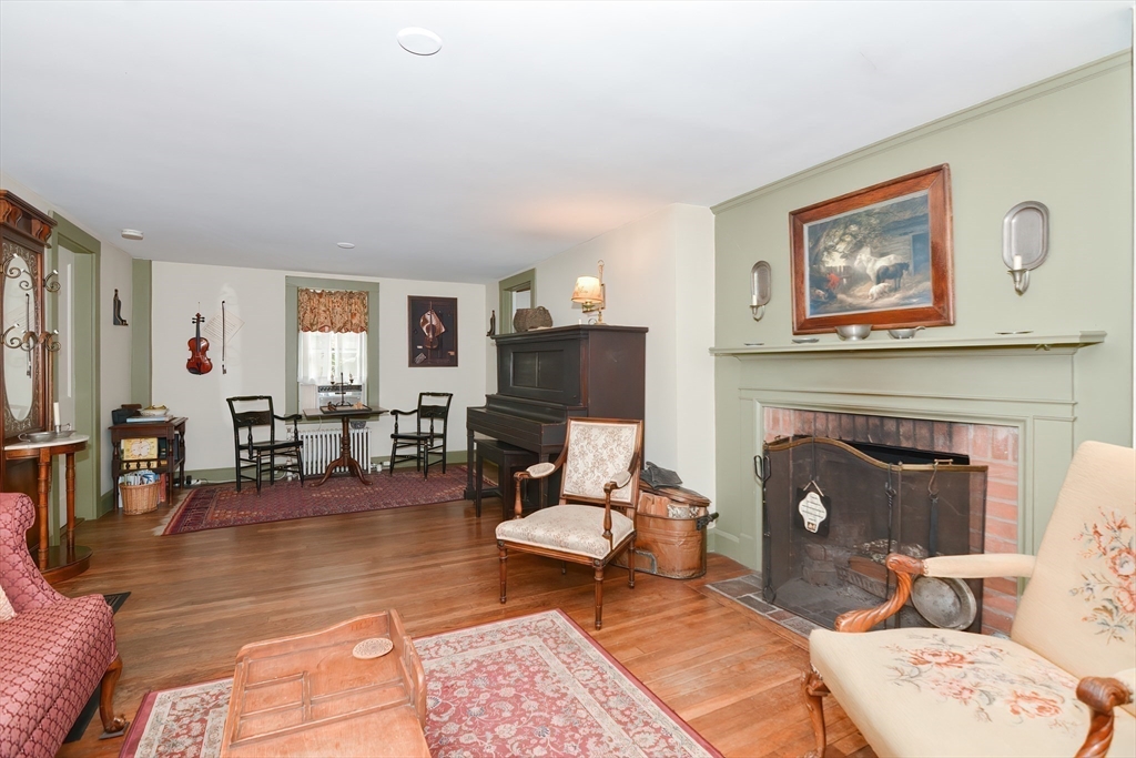 366 Breakneck Road Southbridge, MA 01550 - Photo 6 of 33 a living room with furniture and a fireplace