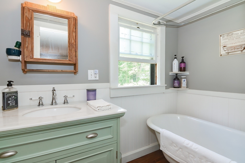366 Breakneck Road Southbridge, MA 01550 - Photo 10 of 33 a bathroom with a tub sink and mirror