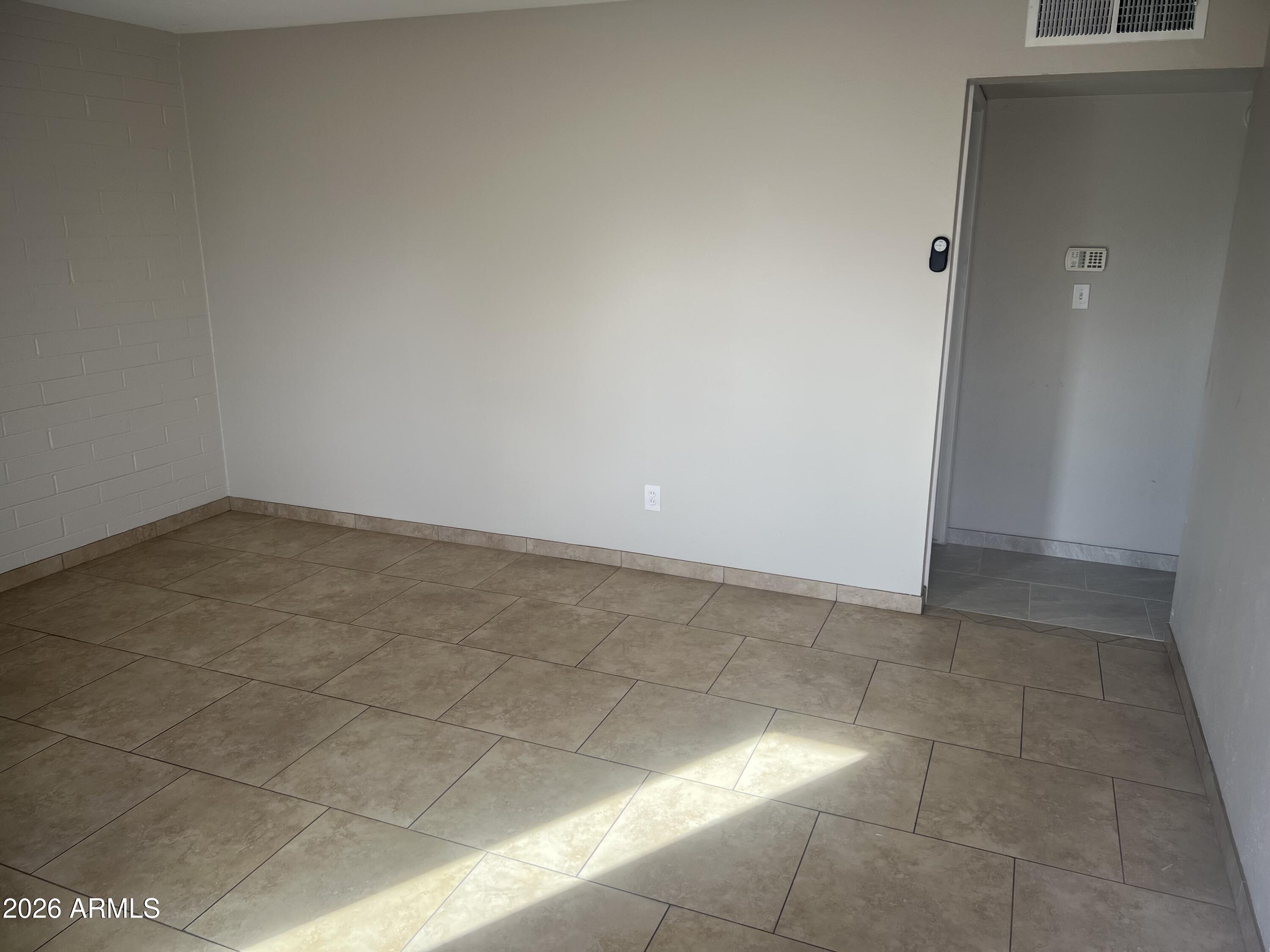 2420 West Butler Drive Phoenix, AZ 85021 - Photo 5 of 16 a view of an empty room
