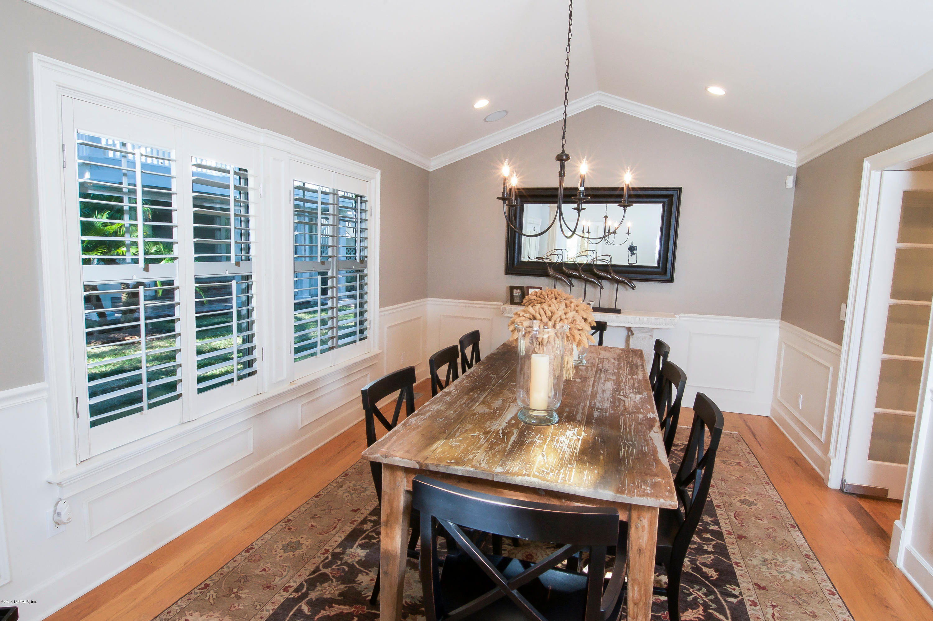1122 Neck Road Ponte Vedra Beach, FL 32082 - Photo 14 of 35 a view of a dining room with furniture window and wooden floor