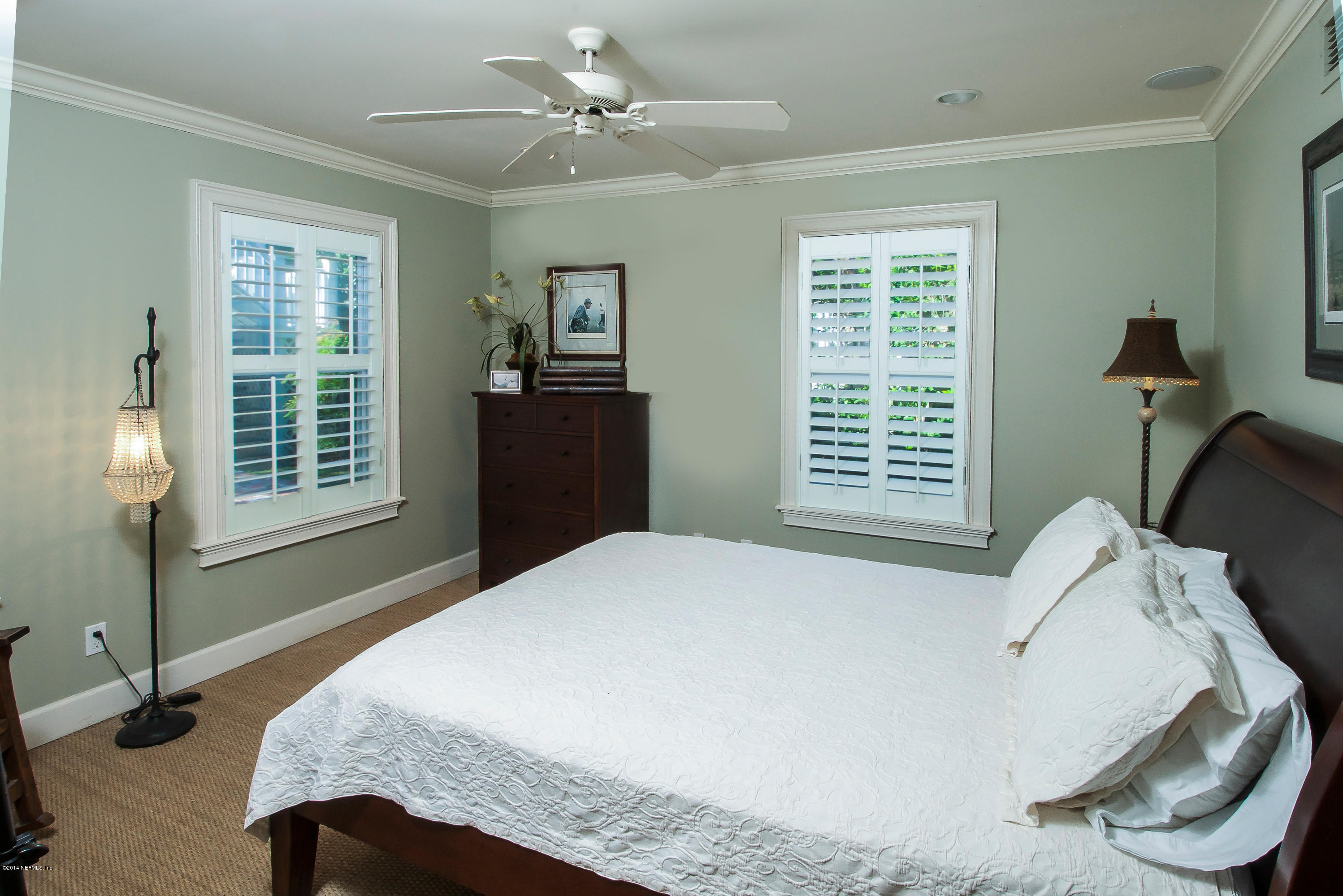 1122 Neck Road Ponte Vedra Beach, FL 32082 - Photo 17 of 35 a bedroom with a bed next to a window