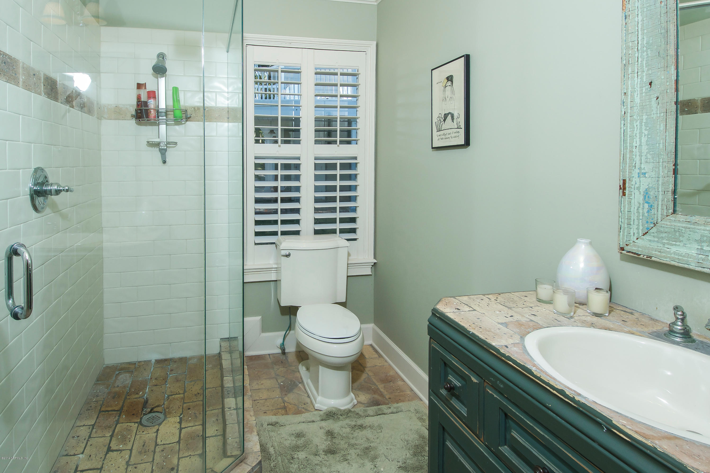 1122 Neck Road Ponte Vedra Beach, FL 32082 - Photo 18 of 35 a bathroom with a sink toilet and shower