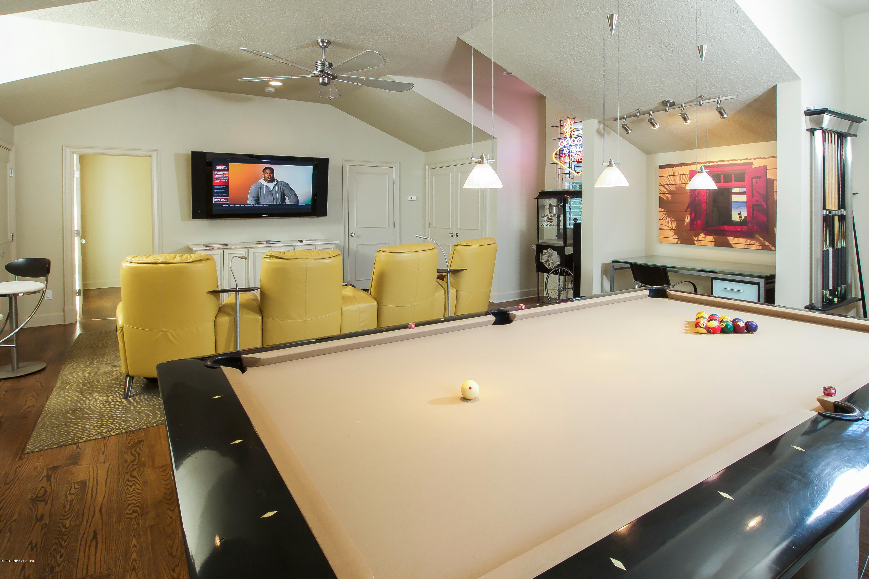 1122 Neck Road Ponte Vedra Beach, FL 32082 - Photo 25 of 35 a view of a living room with a flat screen tv
