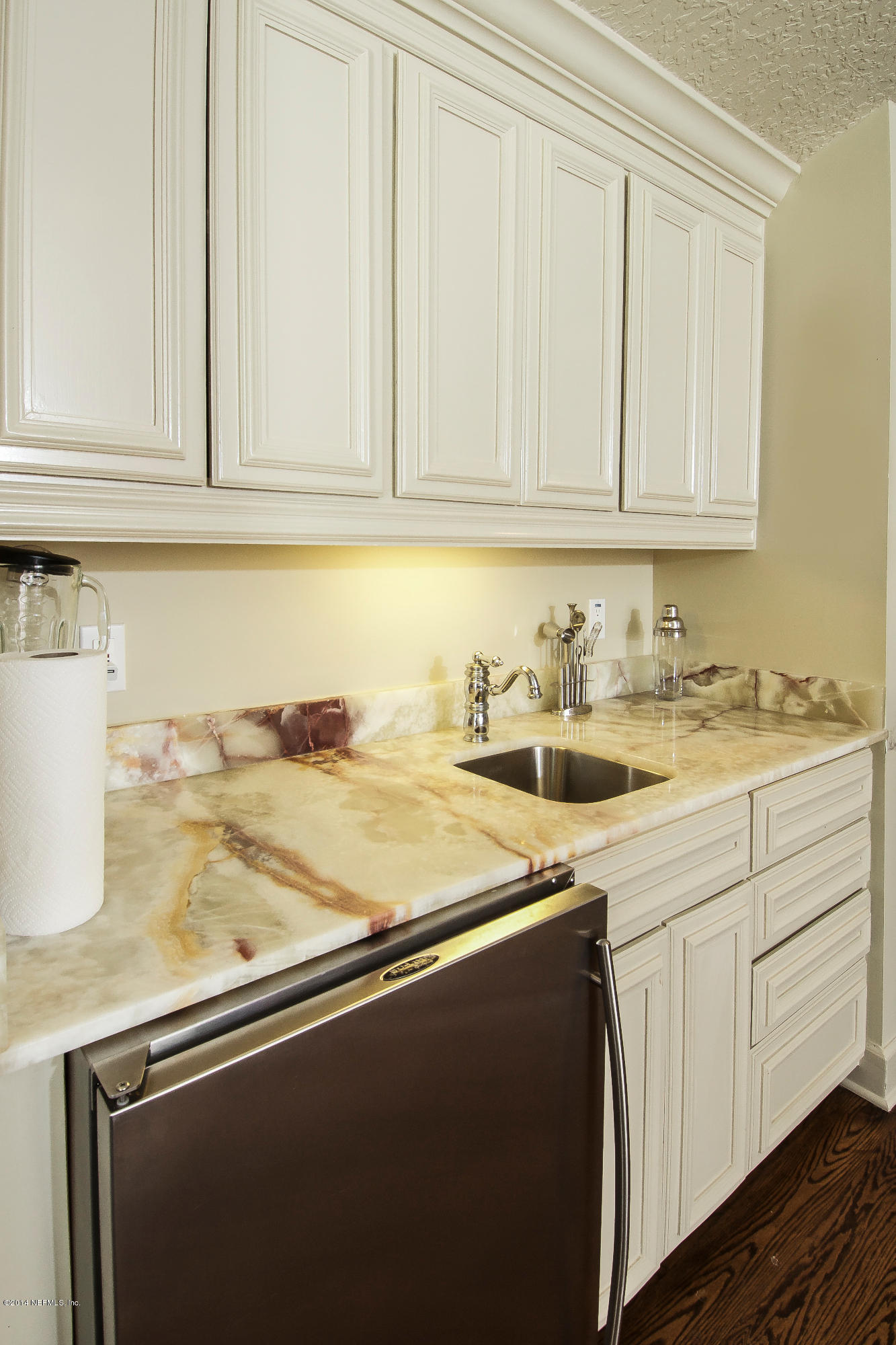1122 Neck Road Ponte Vedra Beach, FL 32082 - Photo 27 of 35 a close view of sink and cabinets