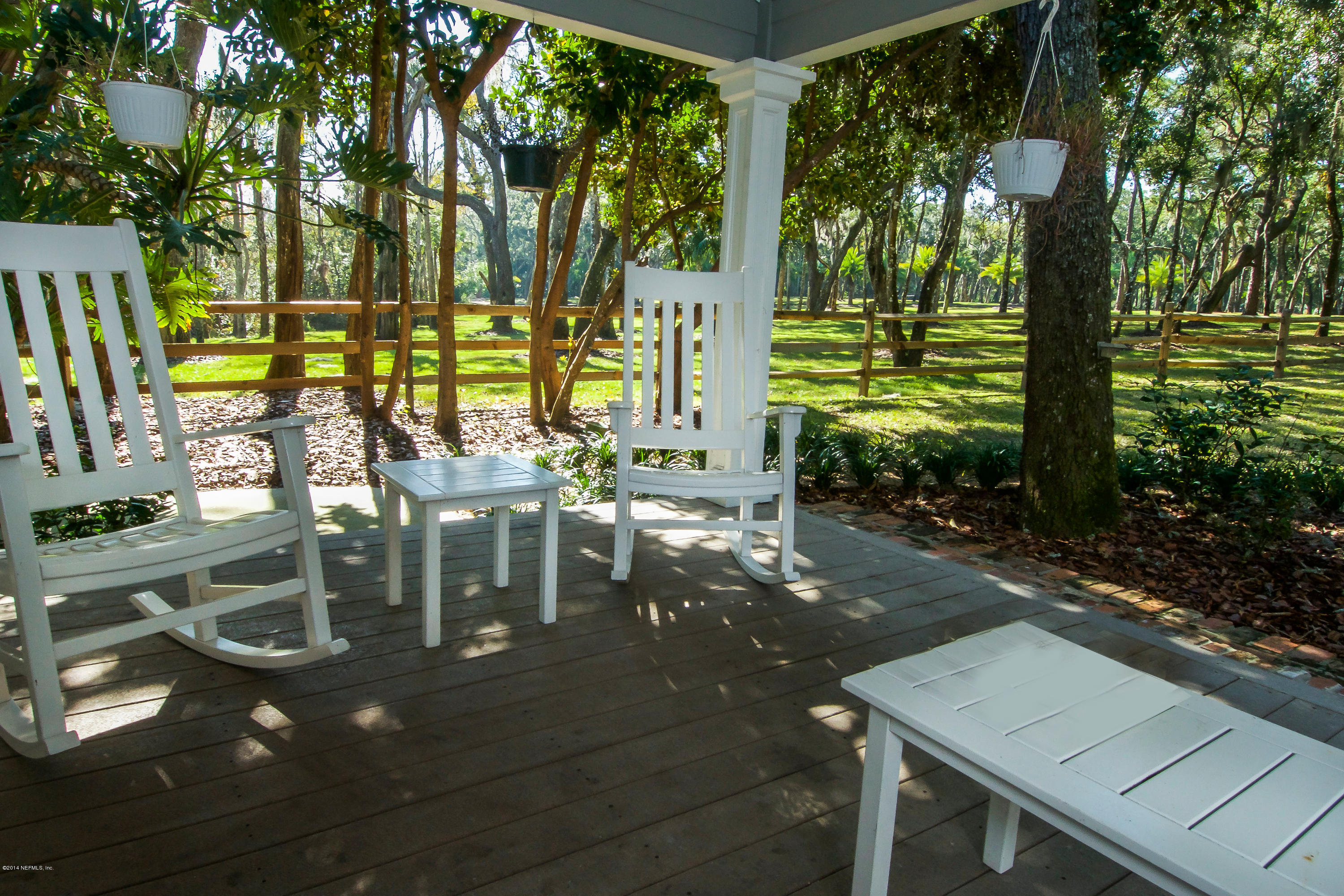 1122 Neck Road Ponte Vedra Beach, FL 32082 - Photo 30 of 35 a view of a swimming pool with a patio