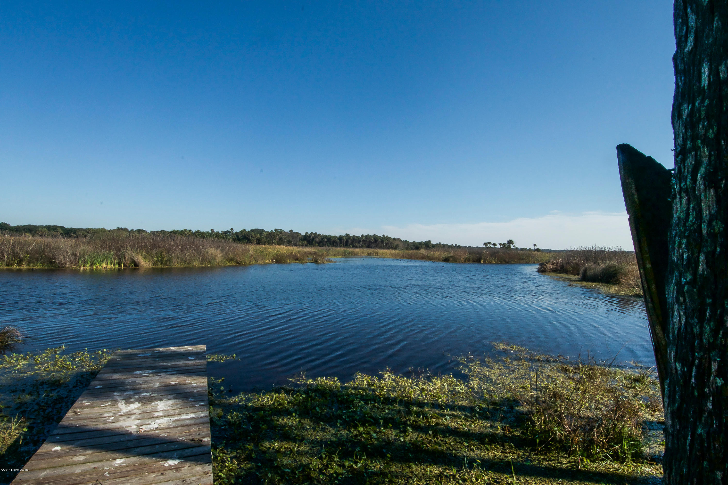 1122 Neck Road Ponte Vedra Beach, FL 32082 - Photo 34 of 35 a view of a lake with a outdoor space