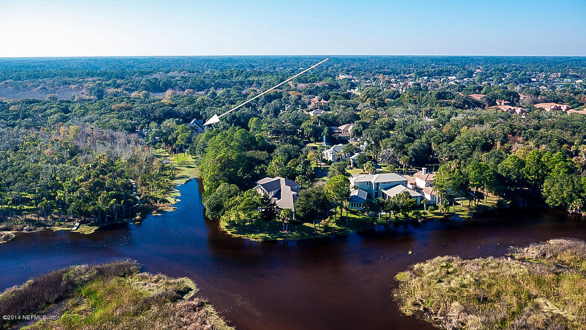 1122 Neck Road Ponte Vedra Beach, FL 32082 - Photo 4 of 35 an aerial view of a houses with a lake view