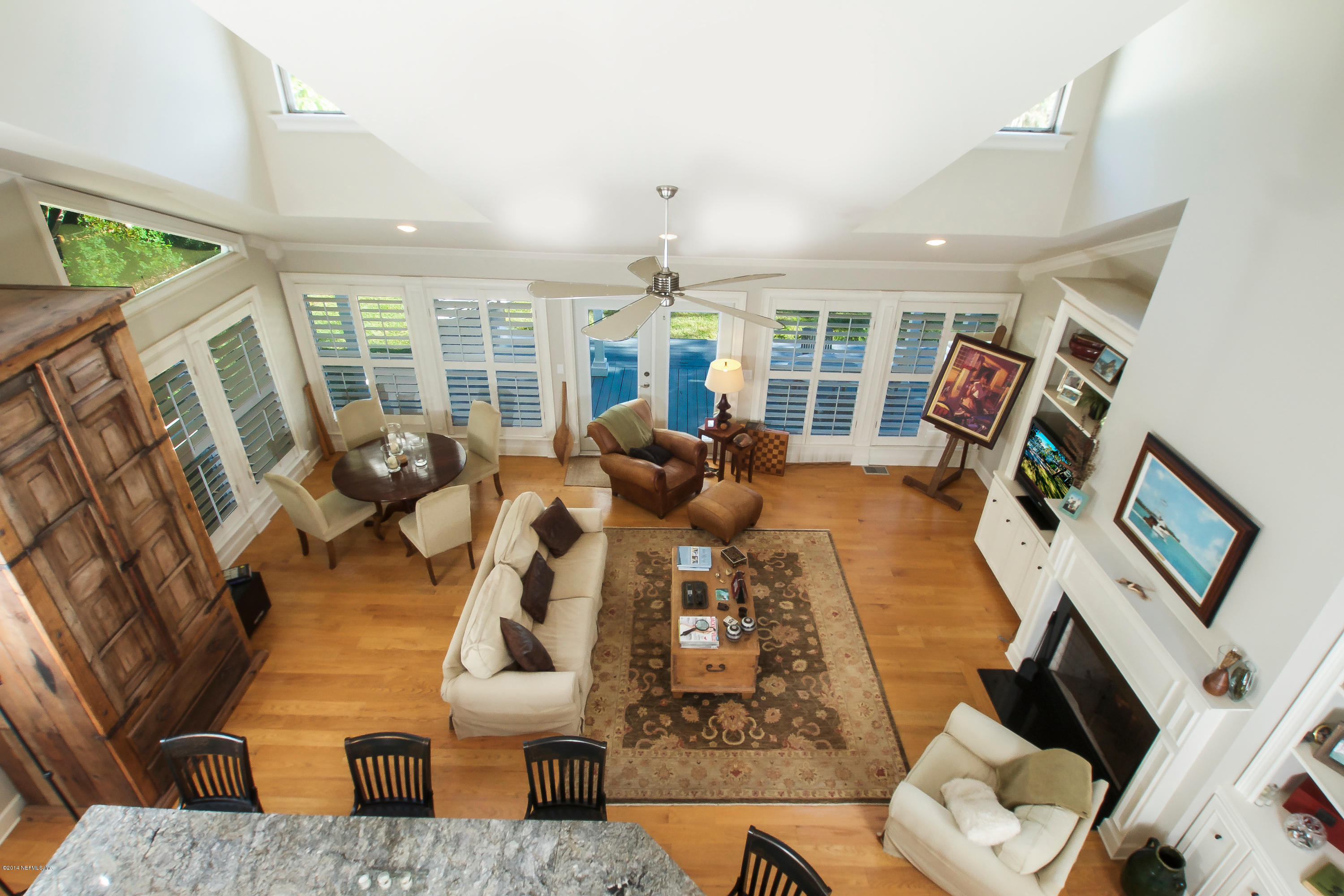 1122 Neck Road Ponte Vedra Beach, FL 32082 - Photo 6 of 35 a living room with furniture fireplace and large windows