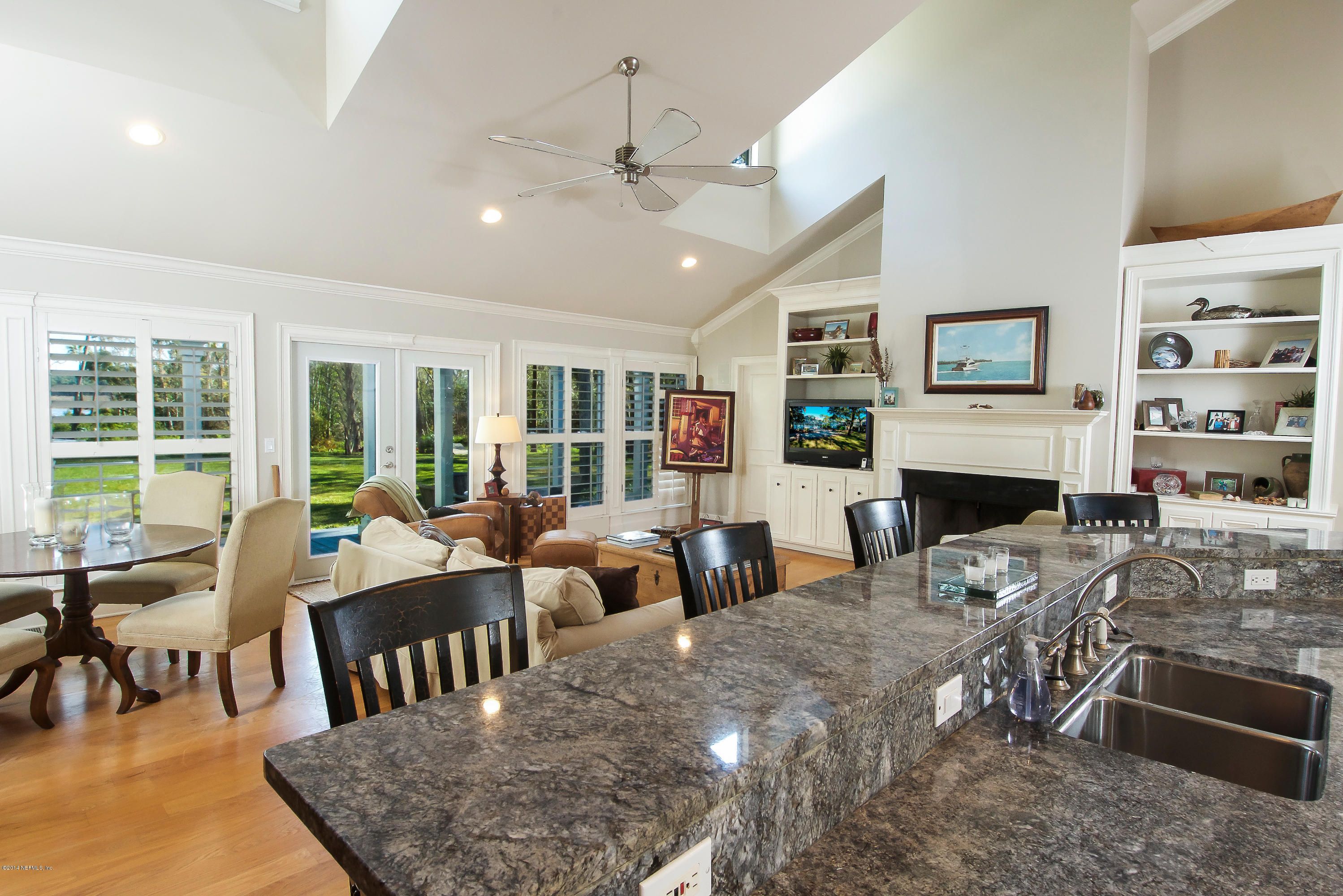 1122 Neck Road Ponte Vedra Beach, FL 32082 - Photo 8 of 35 a living room with fireplace furniture and a rug