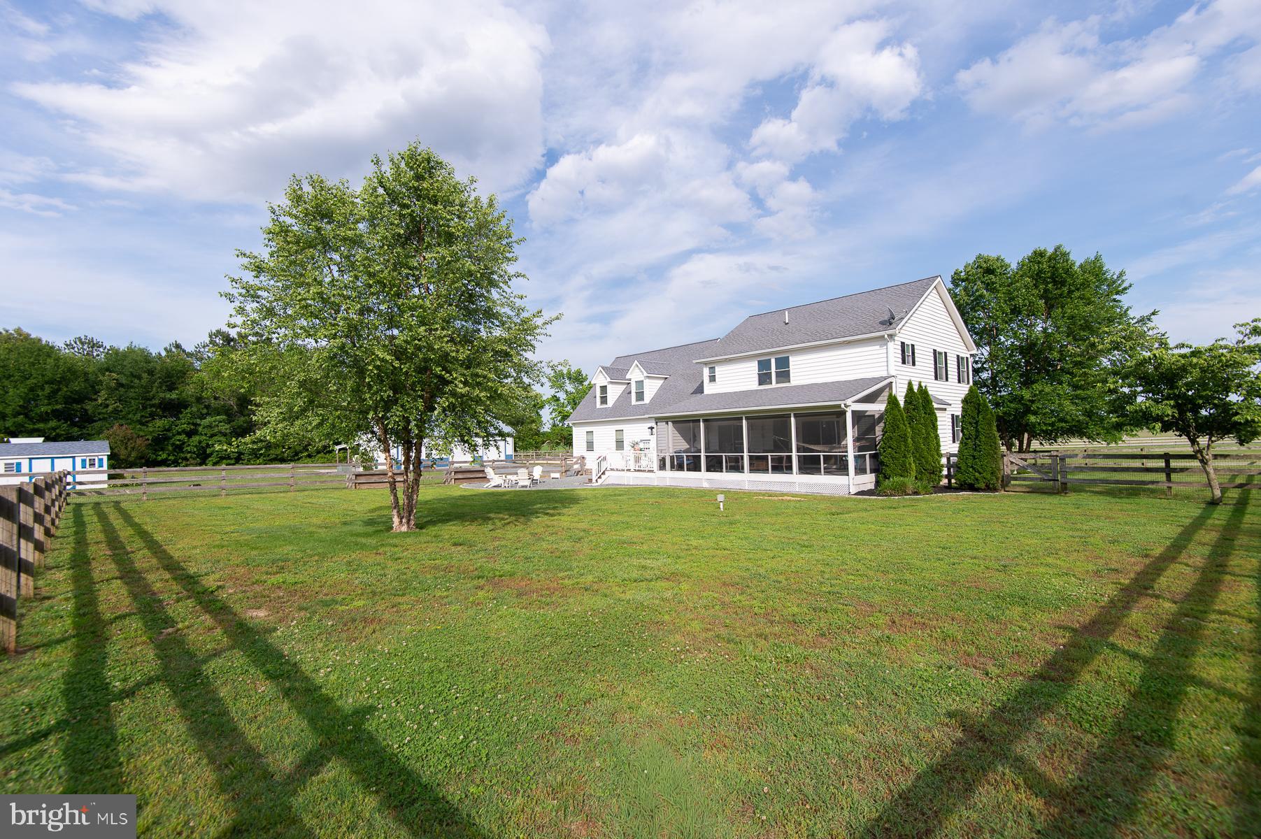 12136 Holly Road Ridgely, MD 21660 - Photo 70 of 136 a front view of a house with a yard
