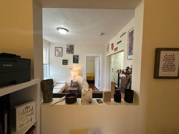 a room with furniture and wooden floor