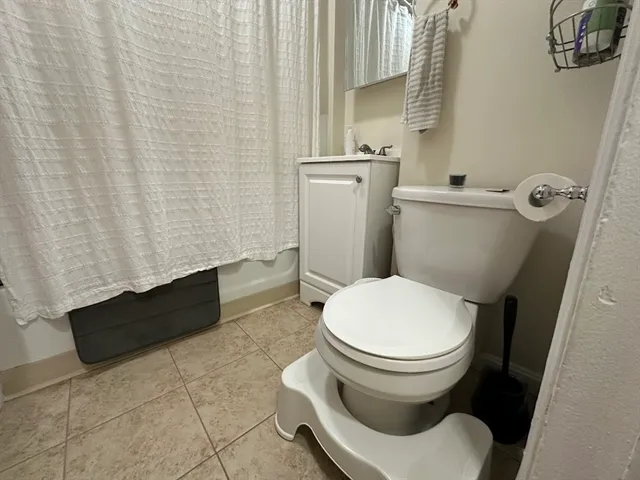 a bathroom with a toilet and a sink