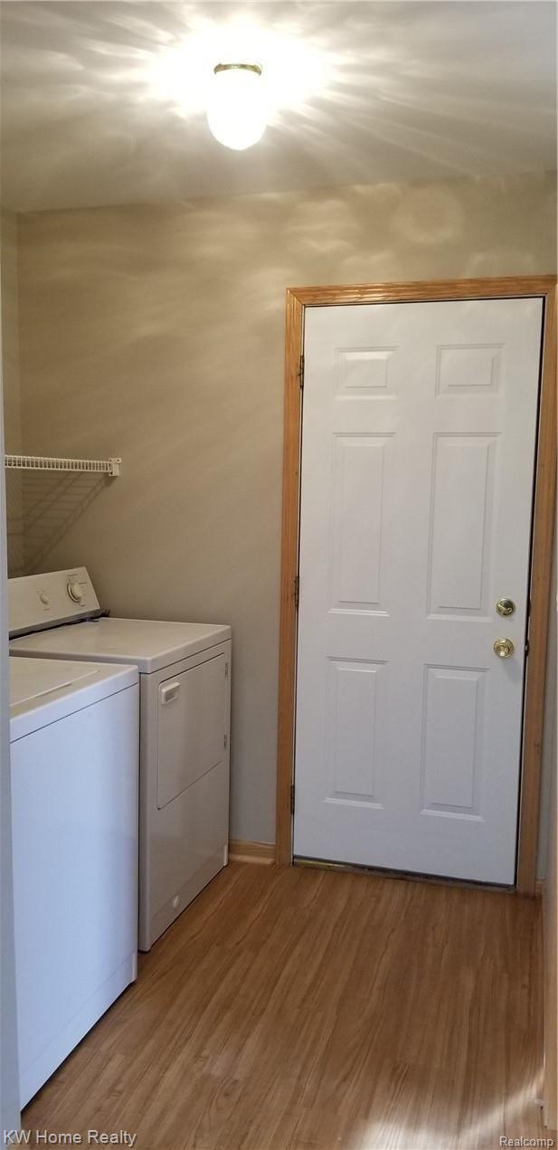 2169 Cove Road Goodells, MI 48027 - Photo 10 of 65 Laundry Room & Garage Entrance