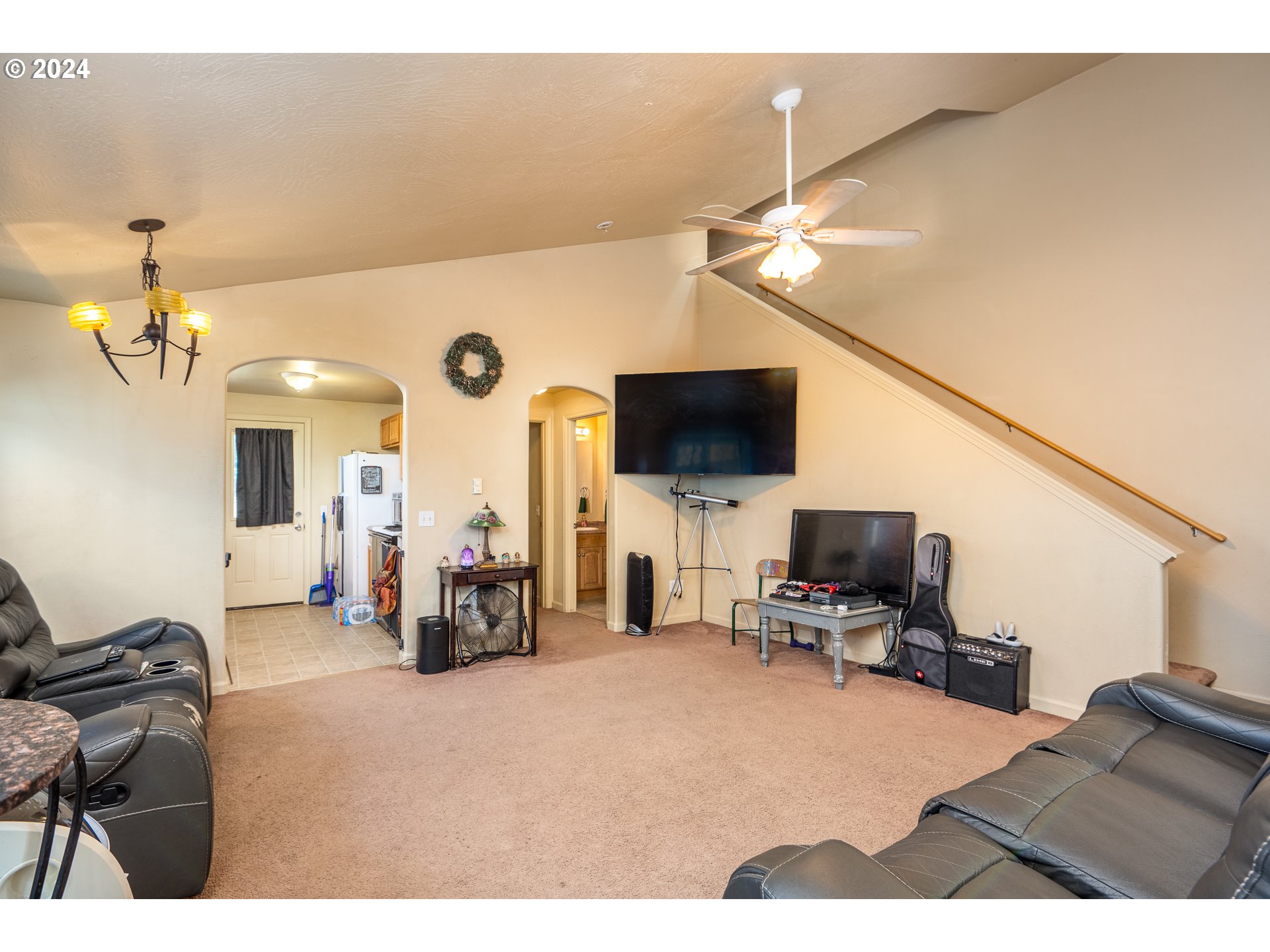 4115 South E Street Springfield, OR 97478 - Photo 23 of 35 a view of a livingroom with furniture and a flat screen tv