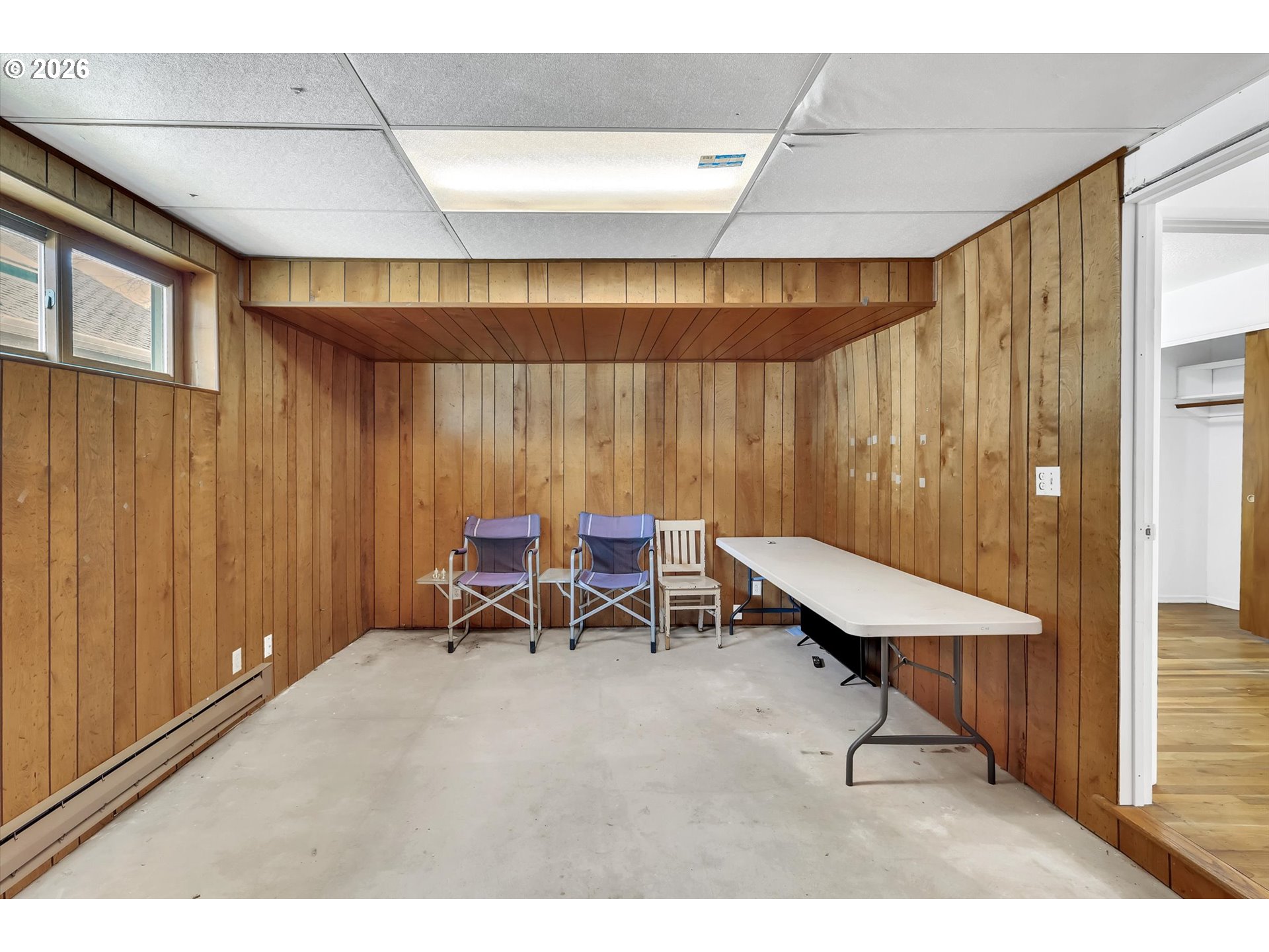 515 Harrison Street Fairview, OR 97024 - Photo 23 of 38 a living room with a table chairs and a window