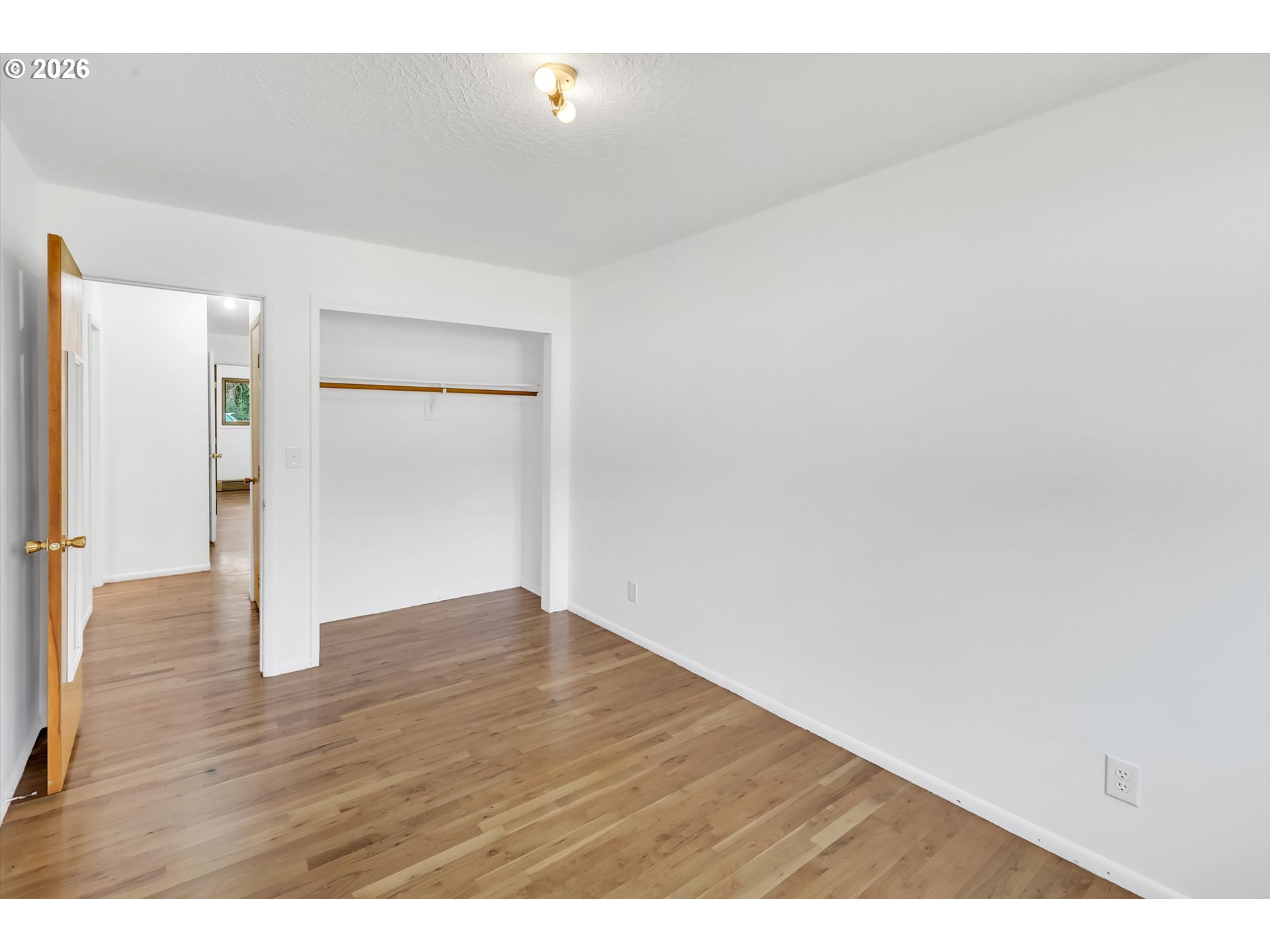 515 Harrison Street Fairview, OR 97024 - Photo 26 of 38 a view of an empty room and wooden floor