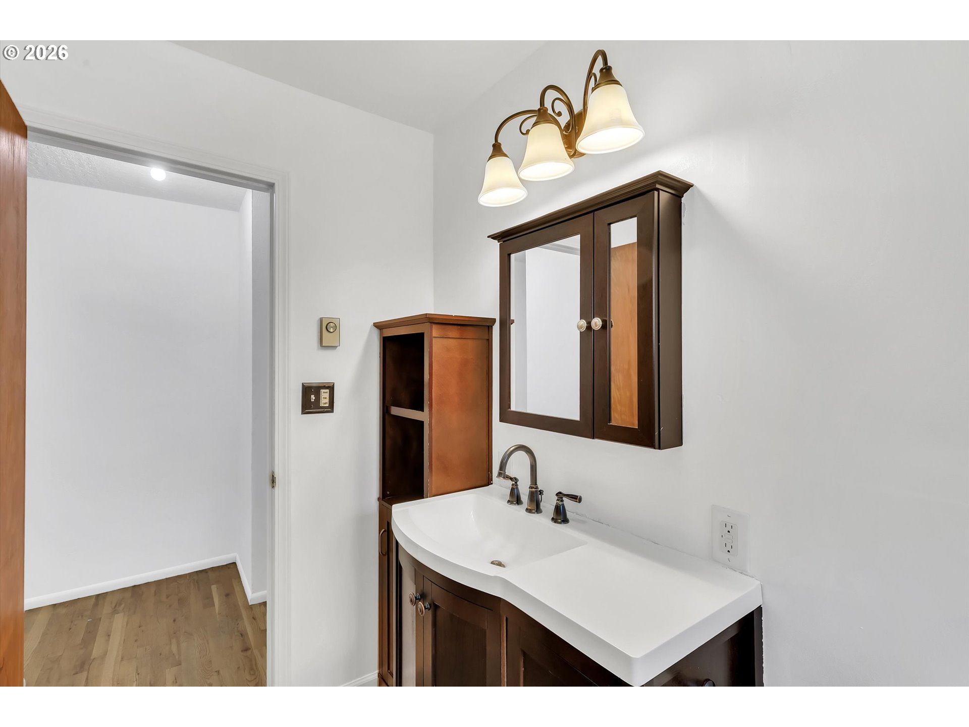 515 Harrison Street Fairview, OR 97024 - Photo 29 of 38 a bathroom with a sink and a mirror