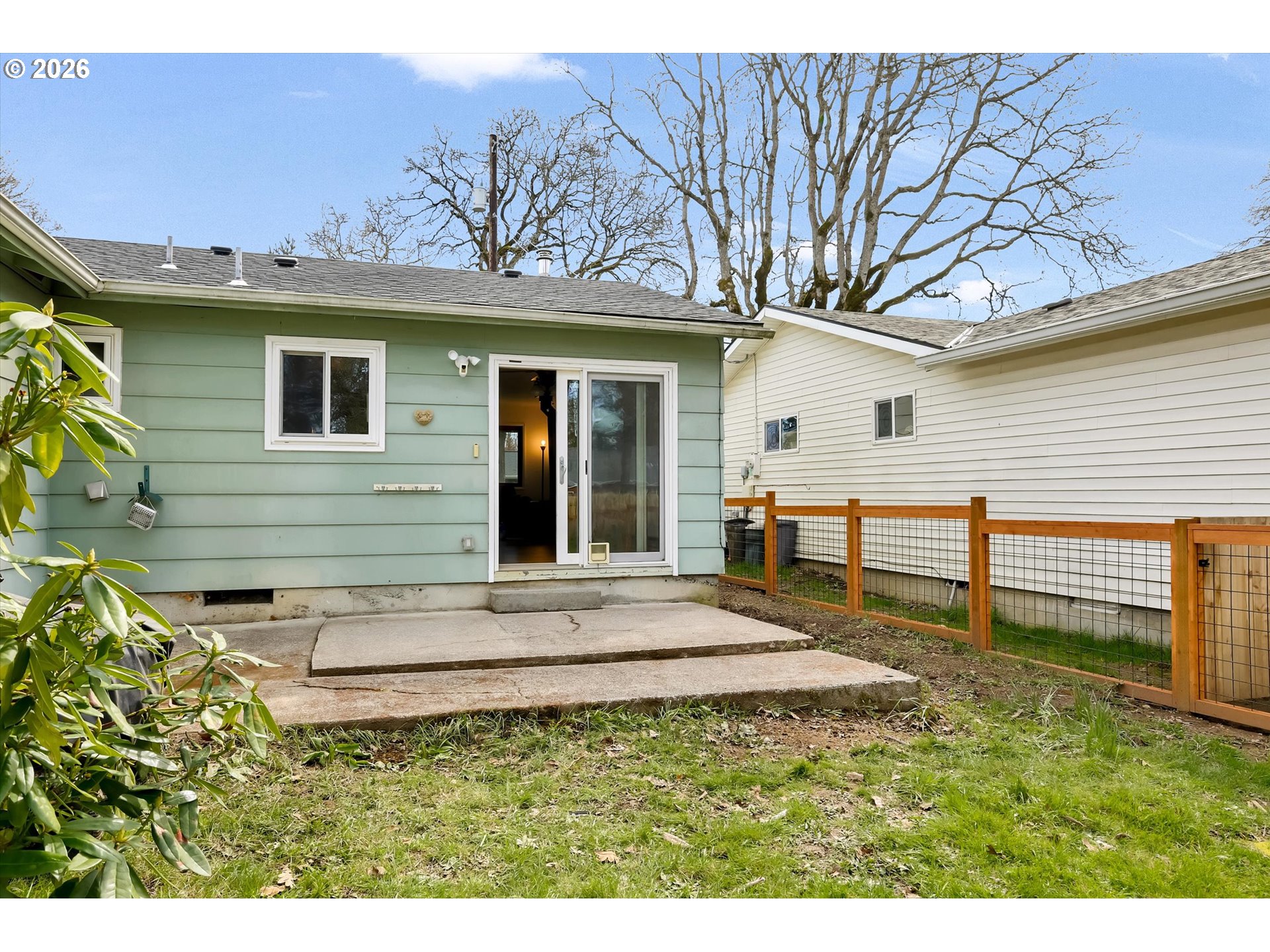 515 Harrison Street Fairview, OR 97024 - Photo 34 of 38 a backyard of a house with table and chairs