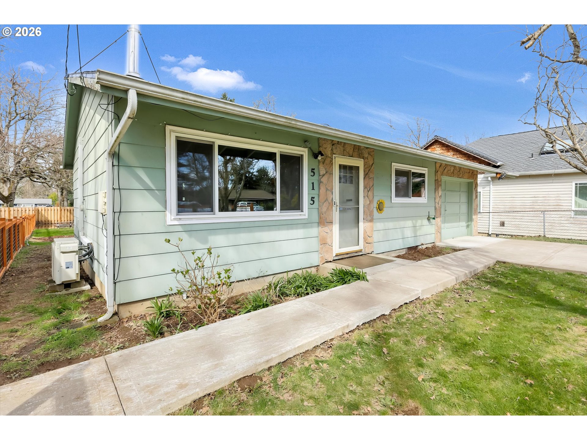 515 Harrison Street Fairview, OR 97024 - Photo 4 of 38 a front view of a house with garden
