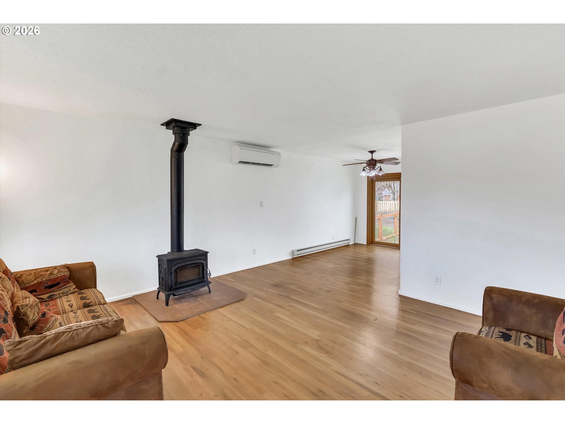 515 Harrison Street Fairview, OR 97024 - Photo 6 of 38 a living room with furniture and a wooden floor