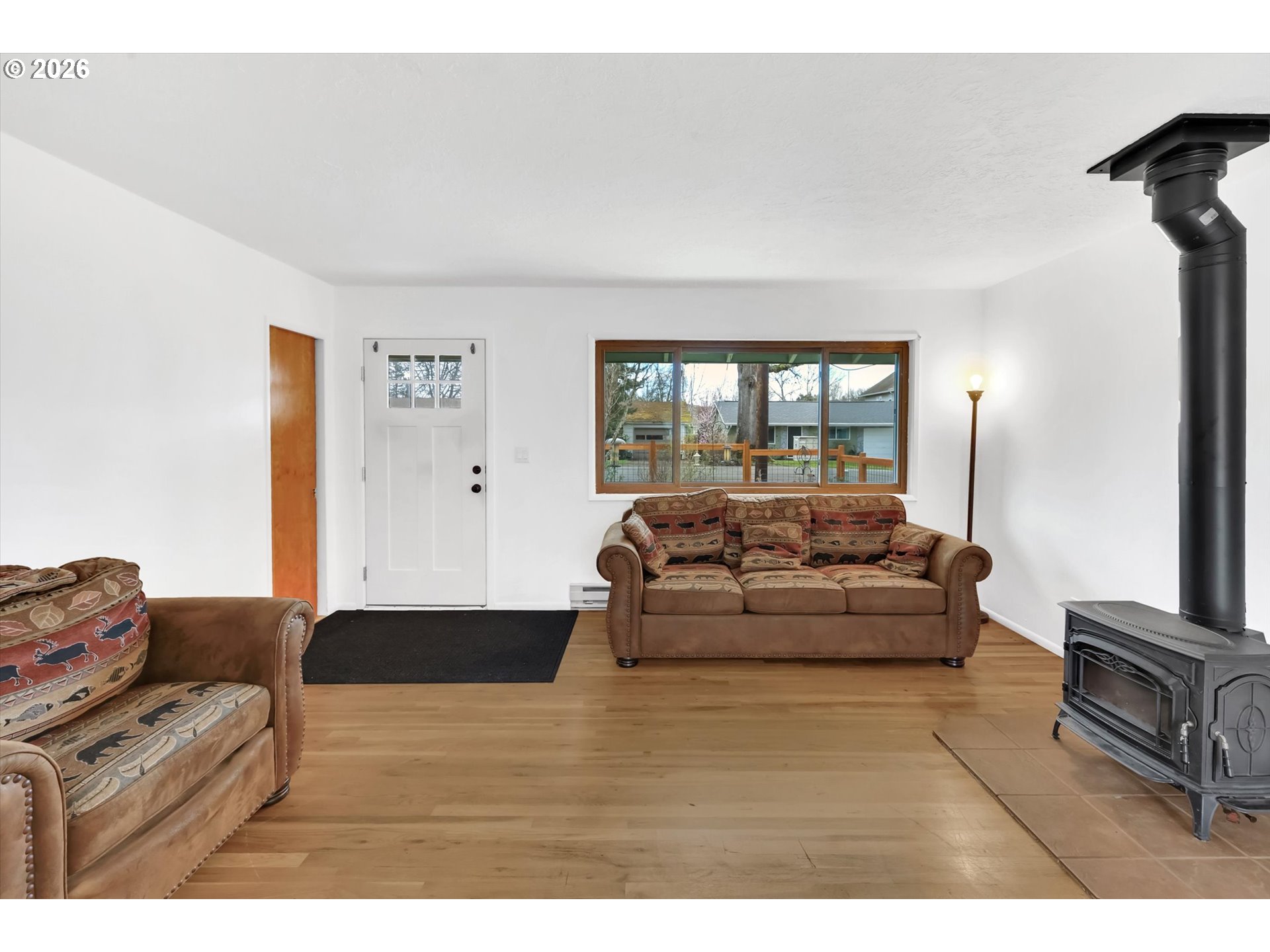 515 Harrison Street Fairview, OR 97024 - Photo 8 of 38 a living room with furniture and a flat screen tv
