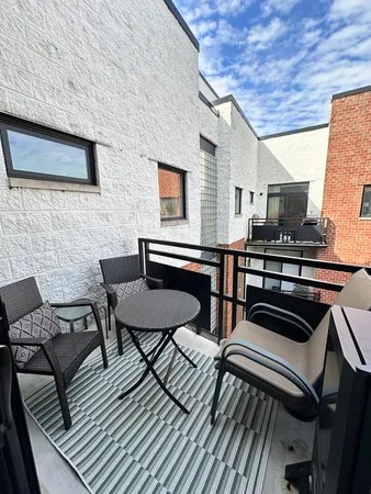 a view of a outdoor seating area with a table