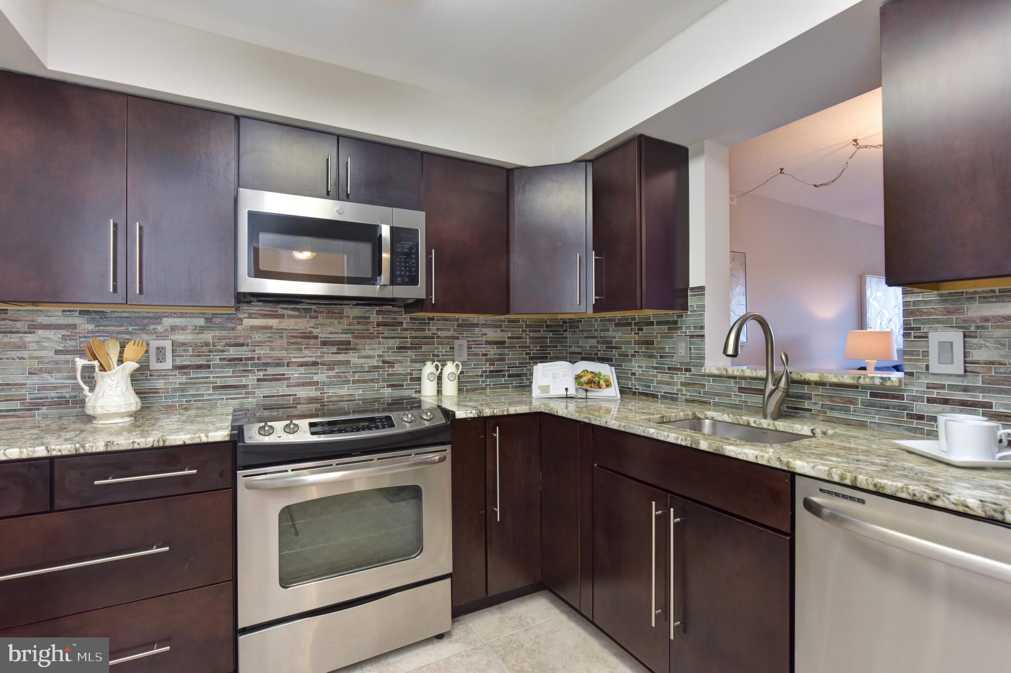 545 East Braddock Road, Unit 201 Alexandria, VA 22314 - Photo 11 of 32 Large kitchen, open to table space