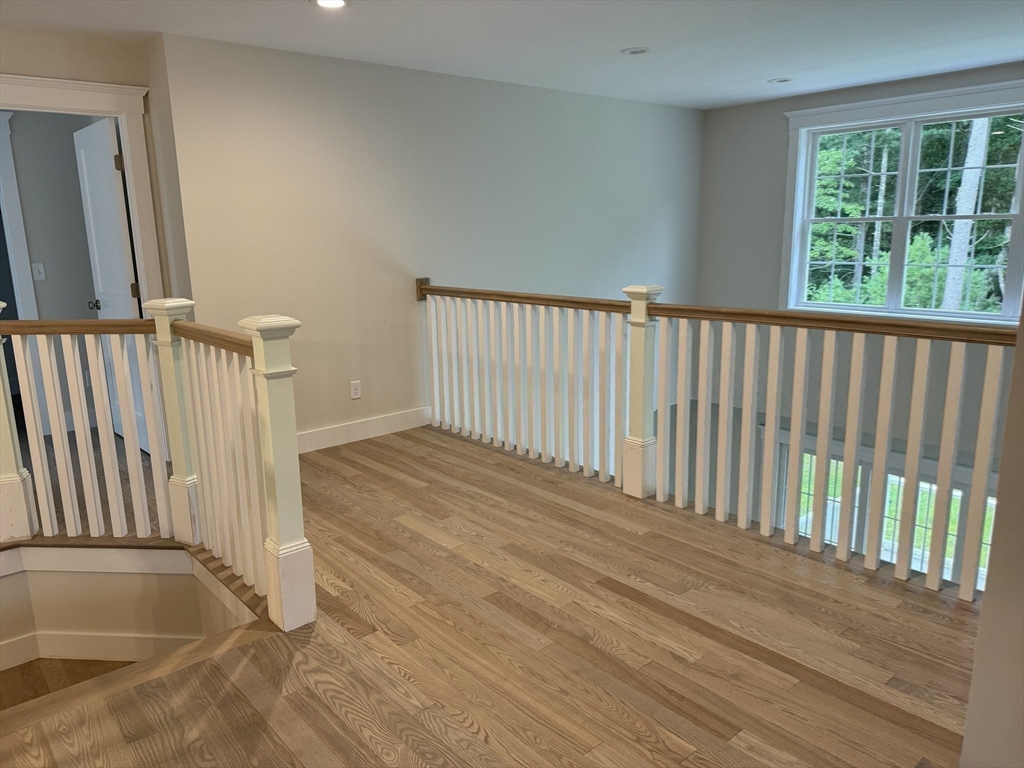 36 Meghan Circle Raynham, MA 02767 - Photo 22 of 37 a view of a balcony with wooden floor