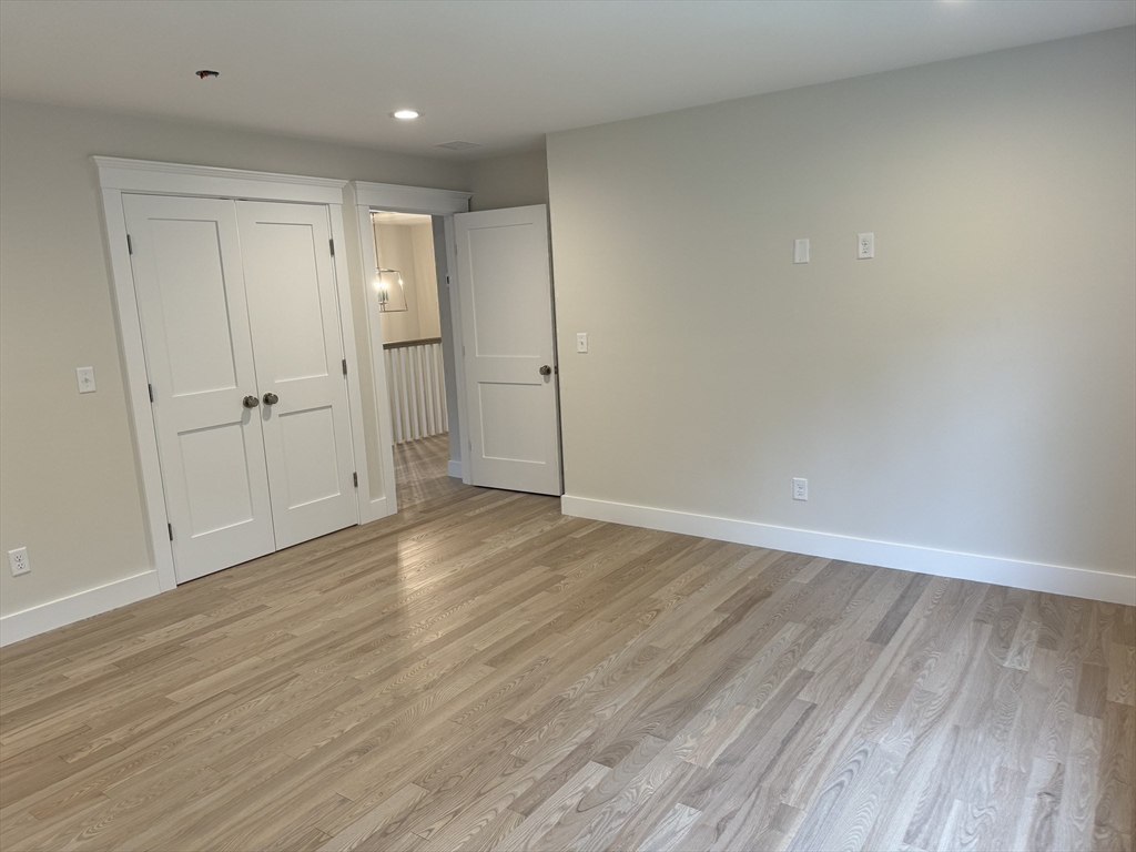 36 Meghan Circle Raynham, MA 02767 - Photo 24 of 37 a view of empty room with wooden floor