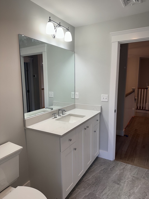 36 Meghan Circle Raynham, MA 02767 - Photo 27 of 37 a bathroom with a sink and a mirror