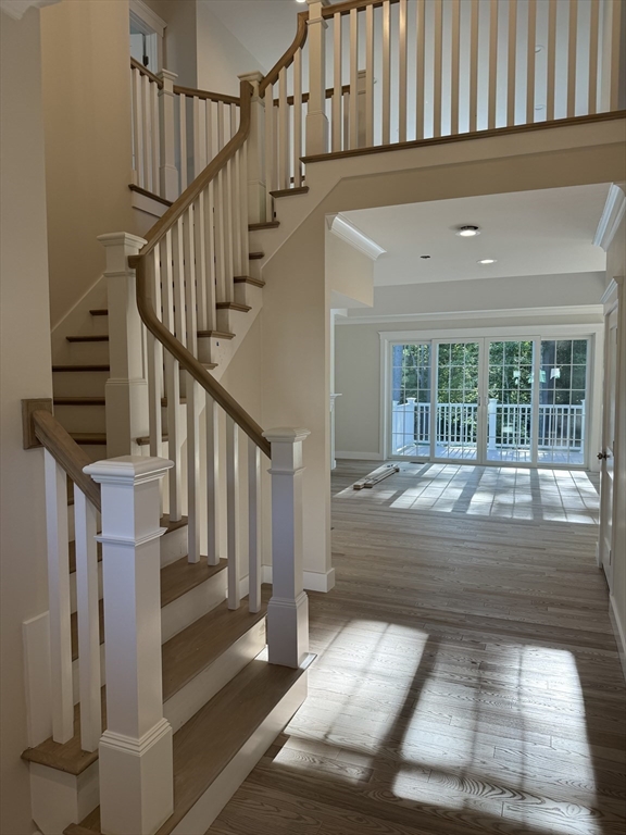 36 Meghan Circle Raynham, MA 02767 - Photo 3 of 37 a view of entryway and hall with wooden floor