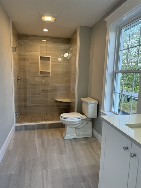 36 Meghan Circle Raynham, MA 02767 - Photo 31 of 37 a bathroom with a toilet and a shower