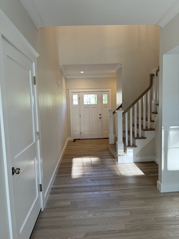 36 Meghan Circle Raynham, MA 02767 - Photo 4 of 37 a view of entryway with wooden floor