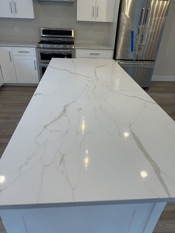 36 Meghan Circle Raynham, MA 02767 - Photo 6 of 37 a view of kitchen and microwave