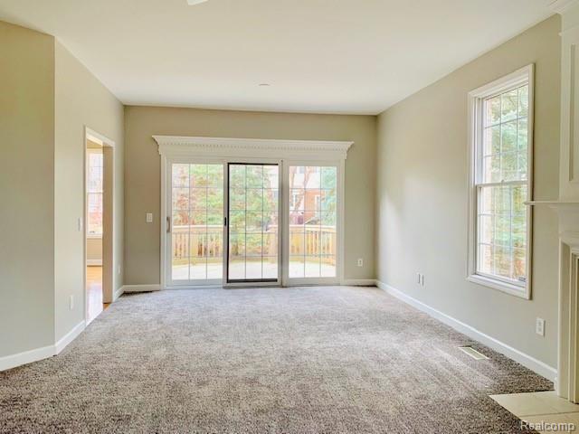 3699 Tremonte Circle Rochester, MI 48306 - Photo 4 of 24 FAMILY ROOM W/DOORWALL TO DECK