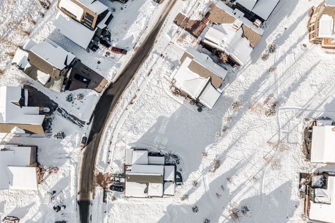 2648 Bronc Buster Loop Steamboat Springs, CO 80487 - Photo 11 of 11 an aerial view of a building with streets and trees