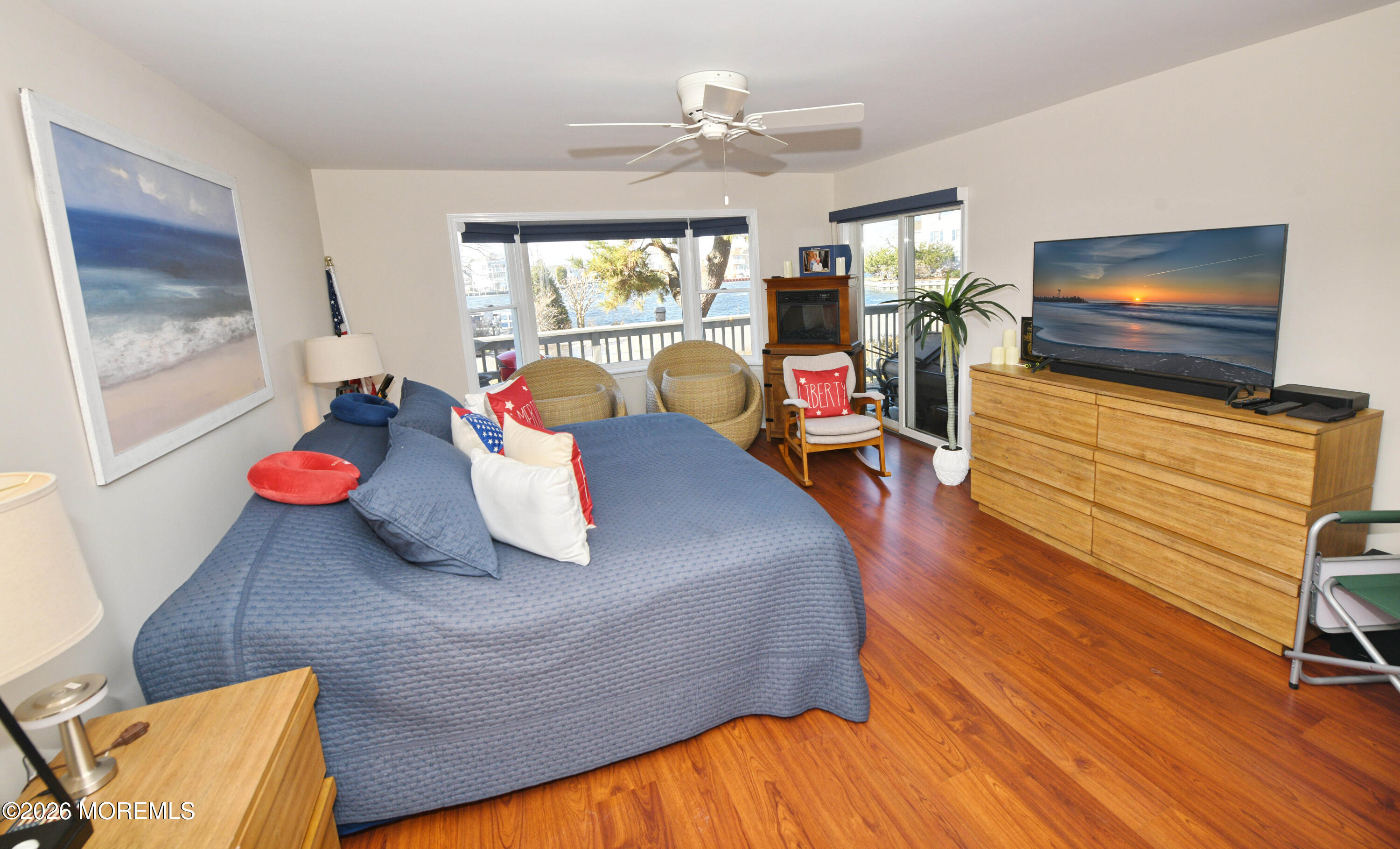 77 Bay Point Harbour Point Pleasant, NJ 08742 - Photo 18 of 39 a living room with furniture and a flat screen tv