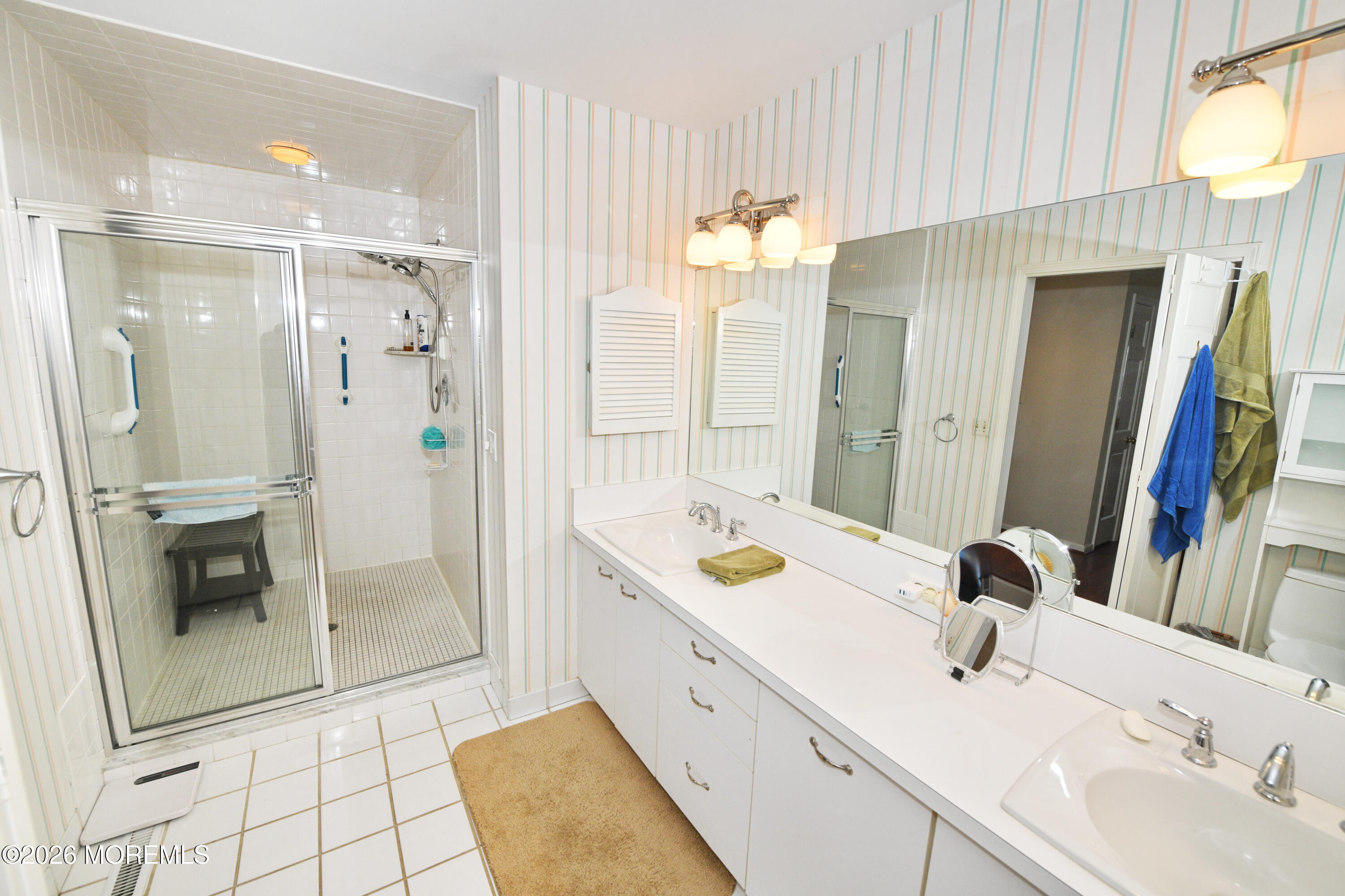 77 Bay Point Harbour Point Pleasant, NJ 08742 - Photo 19 of 39 a bathroom with a tub sink and shower