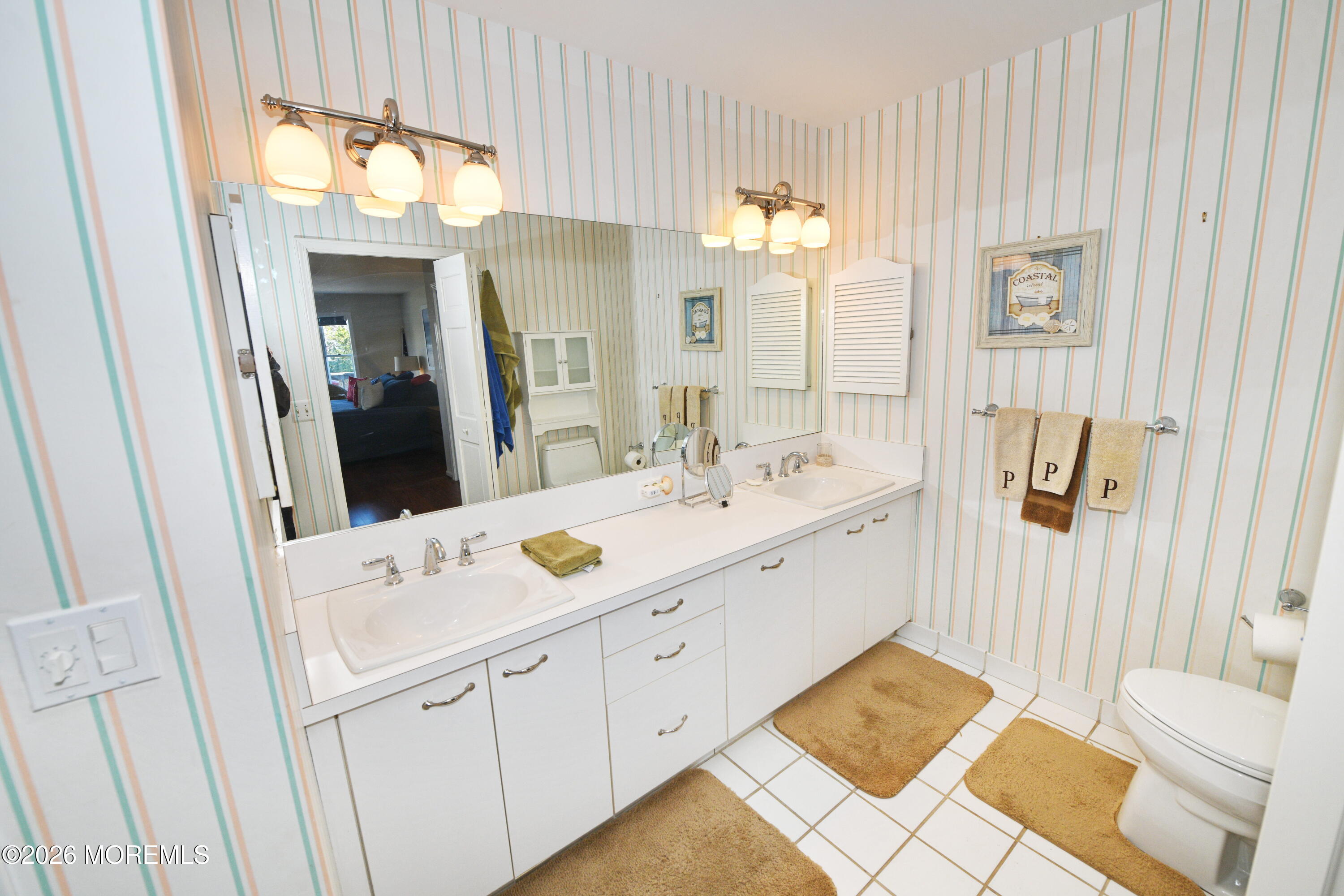 77 Bay Point Harbour Point Pleasant, NJ 08742 - Photo 20 of 39 a spacious bathroom with a double vanity sink and a mirror