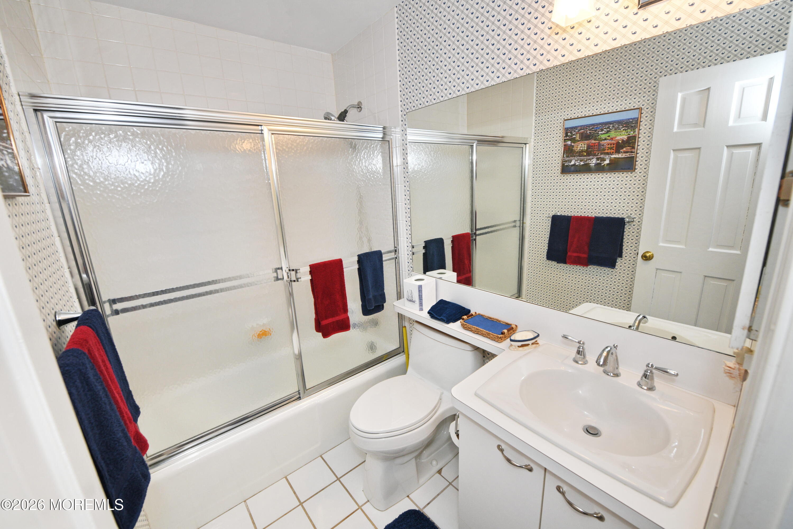 77 Bay Point Harbour Point Pleasant, NJ 08742 - Photo 23 of 39 a bathroom with a sink and a mirror