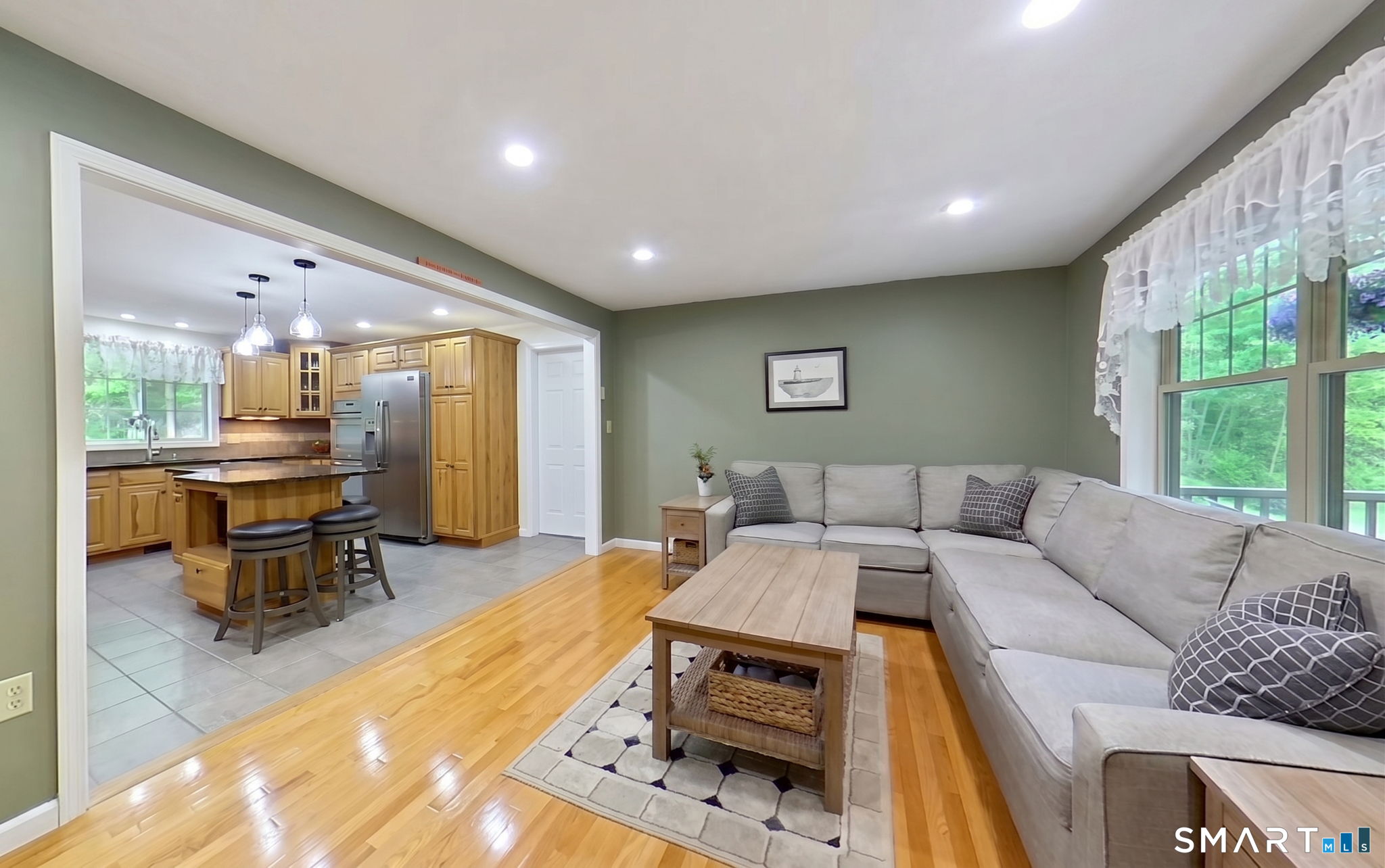 118-1 Whippoorwill Road Old Lyme, CT 06371 - Photo 11 of 37 Family room open to kitchen. Looking from front door.