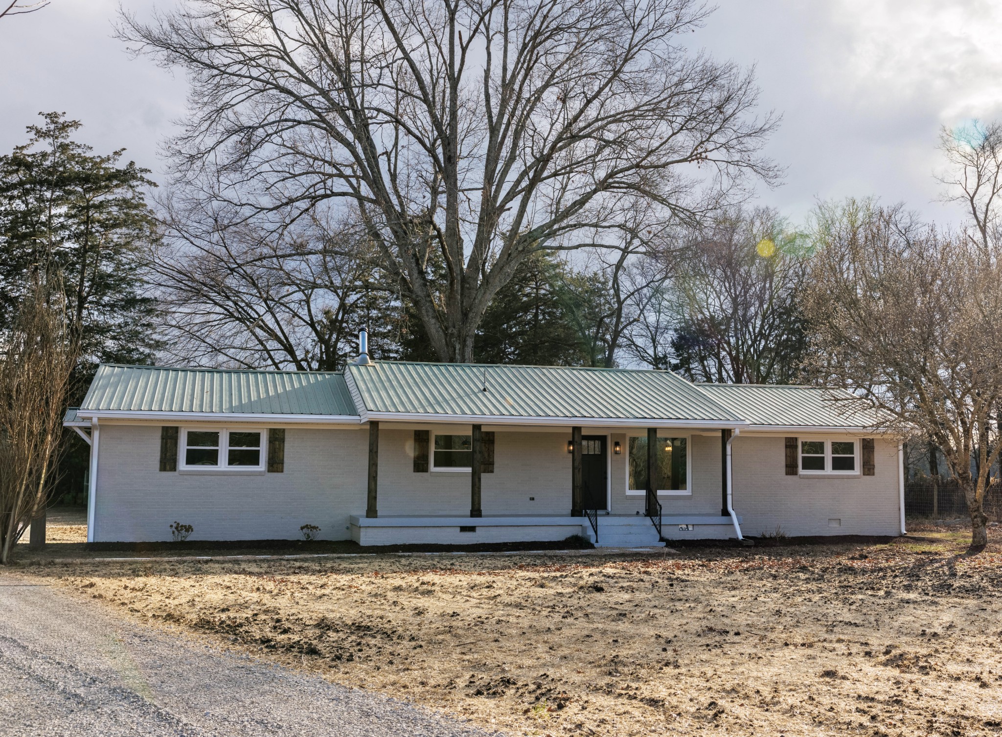 2239 Hunter Bills Road Lewisburg, TN 37091 - Photo 1 of 53 a front view of a house with trees