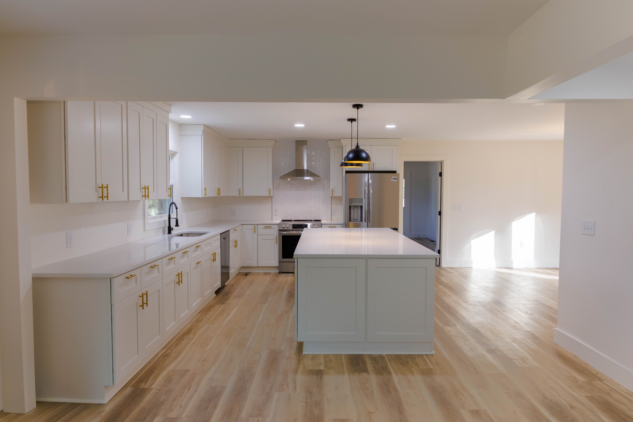 2239 Hunter Bills Road Lewisburg, TN 37091 - Photo 11 of 53 a large kitchen with a lot of counter space and wooden floor